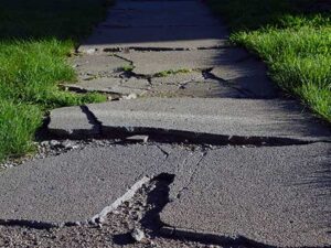 concrete repair & replacement image of broken sidewalk