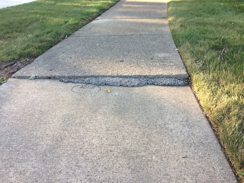 repairing-an-uneven-concrete-walkway-with-concrete-grinding