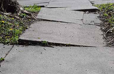 trip hazard repair image of uneven concrete sidewalk
